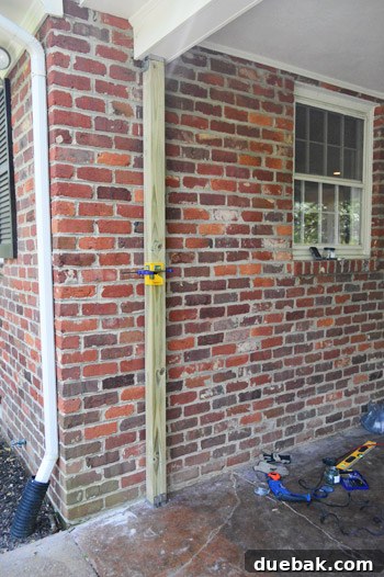 Attaching ceiling post base for pergola column
