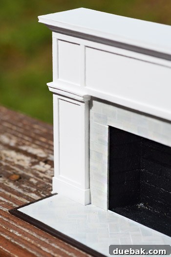 Another perspective on the miniature fireplace, emphasizing the depth and realistic shadowing, showcasing the intricate details.