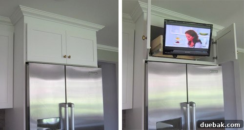 Hidden television seamlessly integrated into kitchen cabinetry.