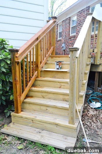 Deck Restoration: A Comprehensive Guide to Staining and Sealing 12 Staining deck railings with a brush