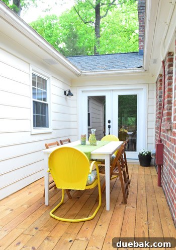 Deck Restoration: A Comprehensive Guide to Staining and Sealing 13 Newly stained deck with a camouflaged utility box
