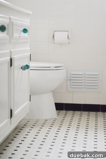 Bathroom With Vintage Basketweave Black And White Tile