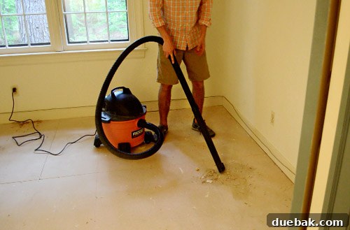 using shopvac to suck up carpet removal debris