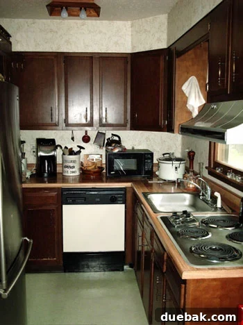Modern white kitchen with new appliances