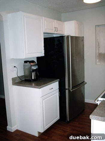 Bright kitchen with modern stove and microwave