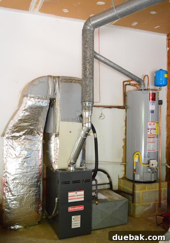 Major Home Upgrades: Furnace and Roof 11 New Goodman furnace installed, looking clean and efficient.