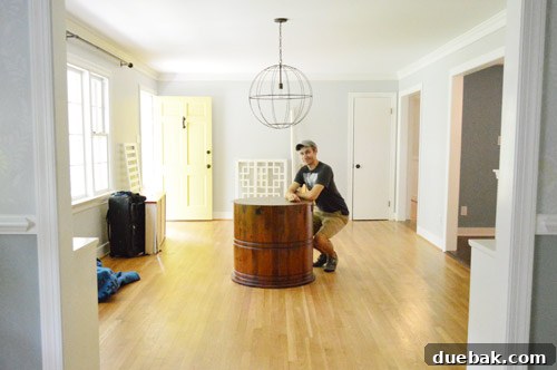 Third Home, First Footprint 19 Couple posing playfully during the moving process, emphasizing the importance of taking breaks and making memories amidst chaos