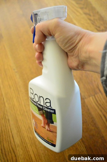 Mop with Bona cleaning pad in action