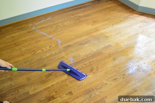 Bona polish being applied with mop