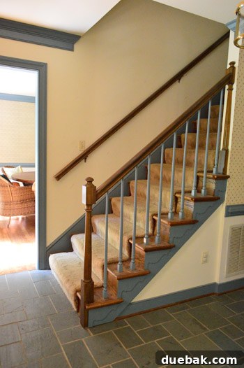 Further wide shot of the office, showing old carpeting that still needs to be removed.