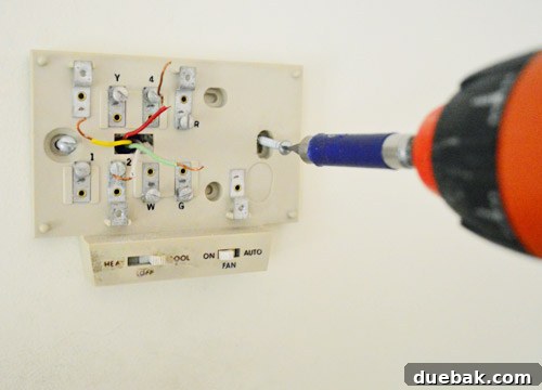 Wall after removing the old thermostat, ready for Nest base