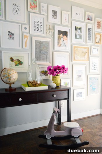 The HGTV Effect 14 Styled hallway with a frame wall and fresh flowers