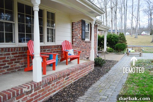 The HGTV Effect 25 Red Adirondack chairs added to the porch for a splash of color