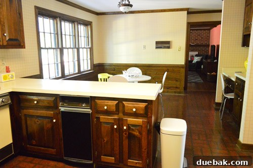 First Chapter 4 Another view of the kitchen, highlighting countertops and appliance placement.