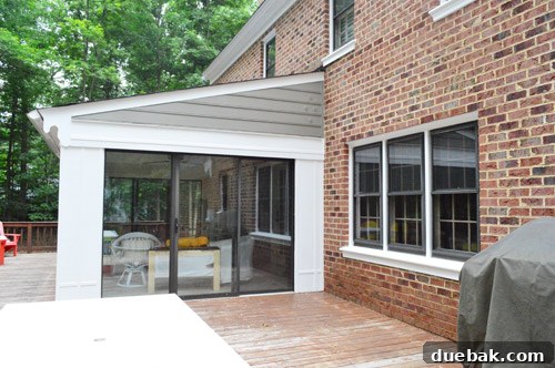 After photo of the sunroom, with crisp new paint and integrated design