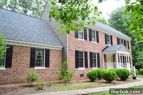 After photo of the house exterior, closer view, with new paint and enhanced dimension