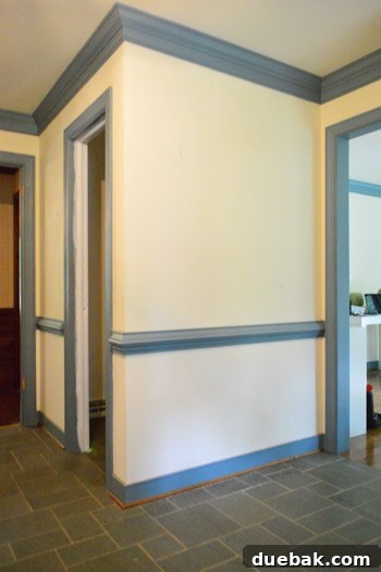 Foyer after wallpaper removal, clean and ready for new decor