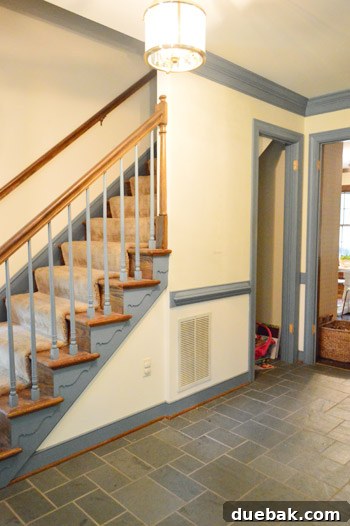 Another view of the renovated foyer, now wallpaper-free