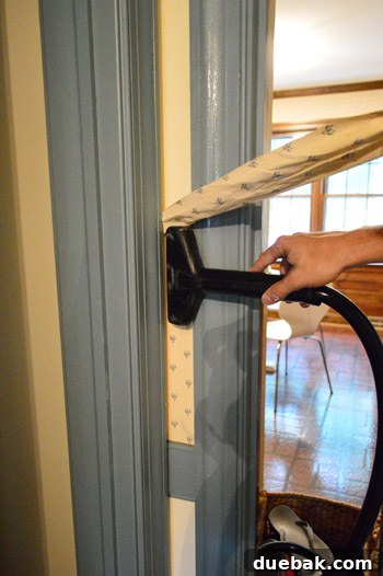 Demonstration of the 'peel as you go' wallpaper removal technique