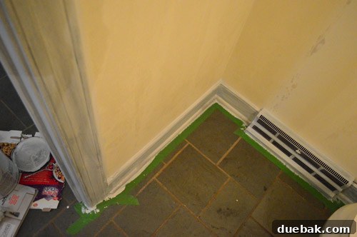 Priming and Painting Your Bathroom 9 First coat of Benjamin Moore Simply White applied to trim and vanity.