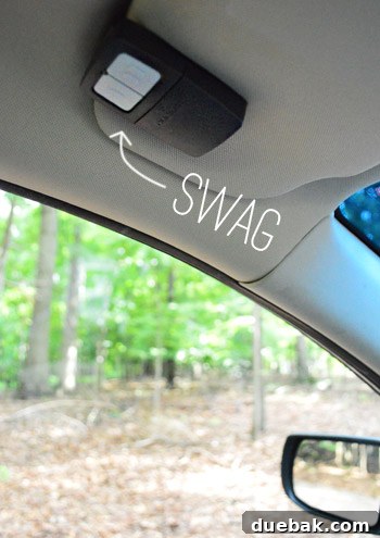 New Clicker universal remote clipped to a car's sun visor