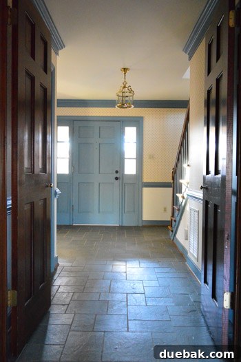 The Bold Secret Behind Your Front Door 7 Before painting: dull entryway lacking personality