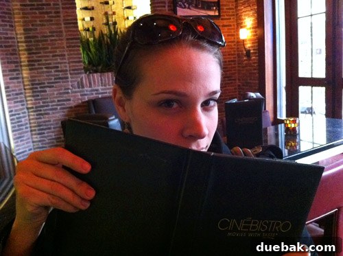 Peeta-siks: The Hunger Games & Hunger Names 3 Sherry posing in a chic manner, excited for the movie date night at CinéBistro.