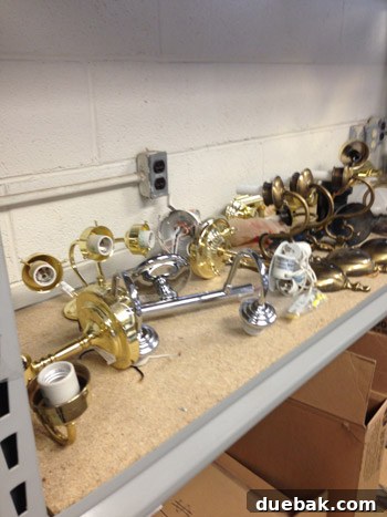 Old chrome light fixture before DIY transformation, found at ReStore
