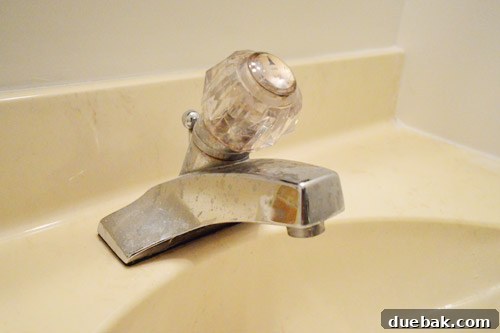DIY Bathroom Faucet Replacement 2 Old leaky single-knob faucet in a half bathroom