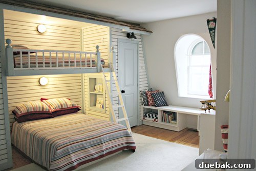 Globetrotter's Den: Map Wallpaper and Bunk Beds for Young Explorers 3 Husband building the built-in bunk bed loft with integrated storage
