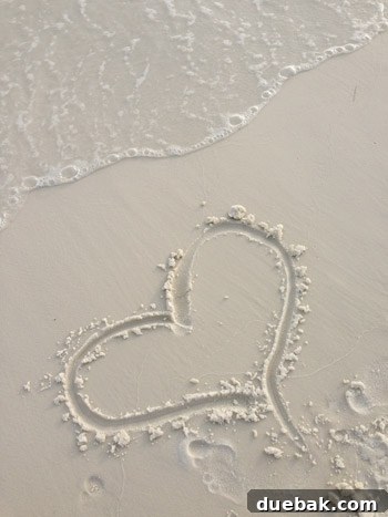 Person enjoying a relaxing moment on a sunny beach vacation