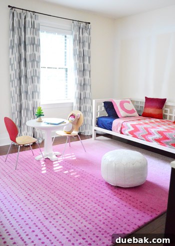 Clara's room with old carpet and blue trim, in progress of becoming a personalized haven