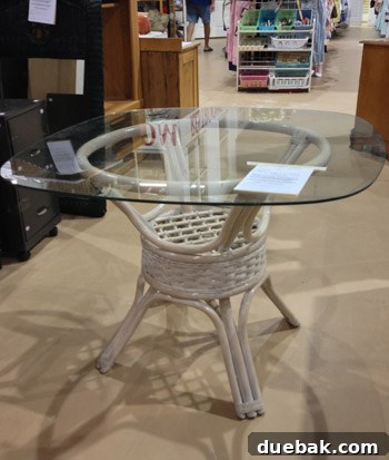 Unearthing Thrift Store Gems 3 Wicker based table with round-square glass top, suitable for a DIY makeover