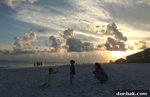 Calm evening waters on Destin beach reflecting the sunset colors