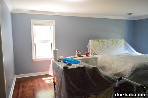 Tinted primer applied to master bedroom walls, creating a solid base for the final paint color