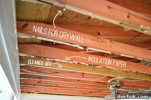 Demolishing Your Old Ceiling: A DIY Guide 13 Cleaning up joists and rafters