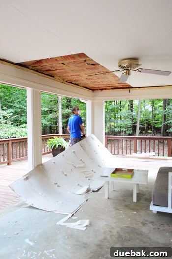 Demolishing Your Old Ceiling: A DIY Guide 7 More drywall being removed