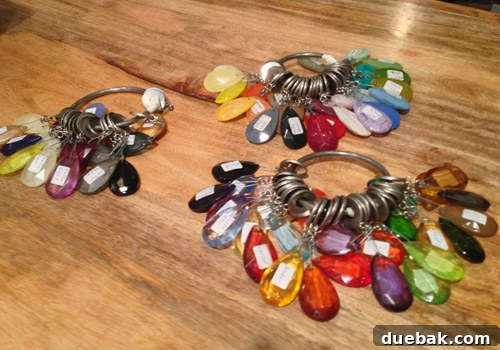 Seaside's Simple Pleasures: Window Shopping The Art of Simple 12 A display of 'rings o' crystals' demonstrating the wide range of customizable color options for bespoke pendant lighting.
