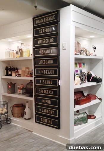 Seaside's Simple Pleasures: Window Shopping The Art of Simple 6 A collection of black signs with ivory lettering, including 'The Laundry' and 'The Shanty,' offering stylish and personalized home decor.
