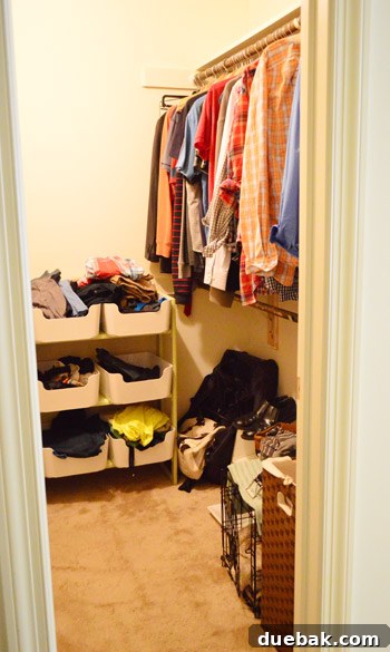 Closet filled with belongings, showing old carpet and a need for organization and built-ins.
