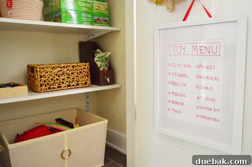 From Coat Closet To Toy Central 13 A repurposed frame serving as a 'menu' with text labels of the toys stored inside the closet.