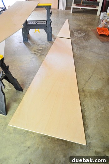 Readying Your Vaulted Ceiling for a Wood Plank Finish 12 Two pieces of cut plywood ready for installation