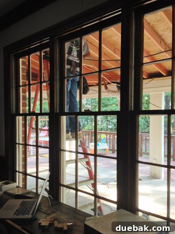 Readying Your Vaulted Ceiling for a Wood Plank Finish 4 Contractors working on the sunroom ceiling reinforcement