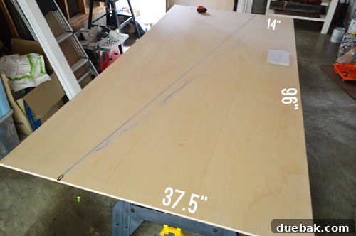 Readying Your Vaulted Ceiling for a Wood Plank Finish 9 Marking plywood with a chalk line for an angled cut