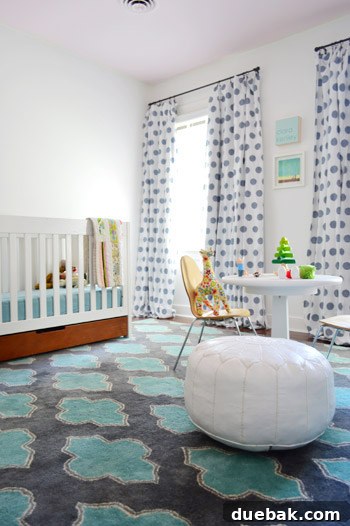 Clara's room with a newly painted pink ceiling and white walls, featuring a bed, rug, and colourful pillows.