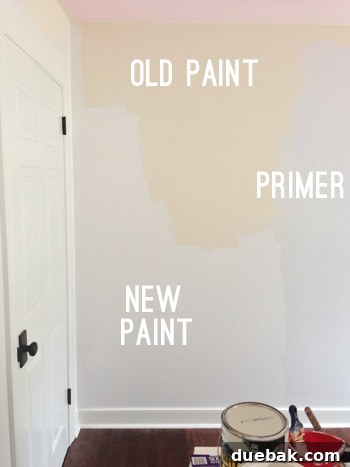 A wall showing a transition from old yellow paint to a cooler primer, and finally the fresh Benjamin Moore Simply White.