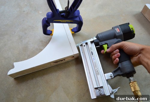 Detailed view of the securely mounted wooden bracket with extended slat