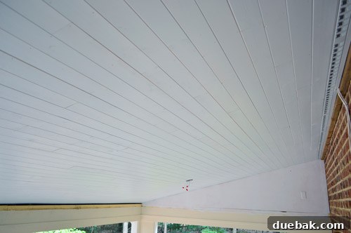 Finished wood planked ceiling