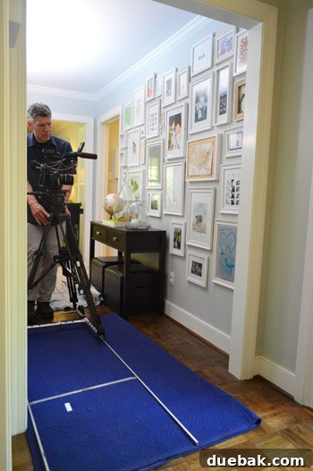 Crew filming the frame hallway, demonstrating their magic behind the scenes