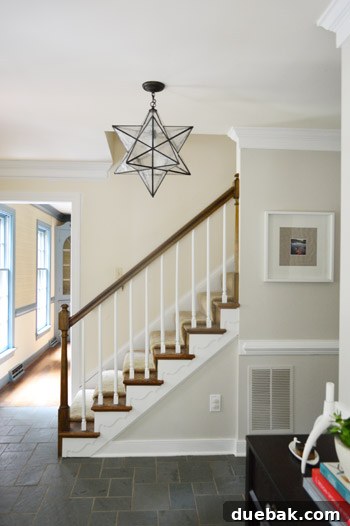 Transform Your Staircase with White Painted Balusters 12 Close up of freshly painted white stair balusters